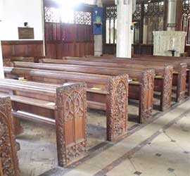 Carved benches, All Saints Church, Holbeton